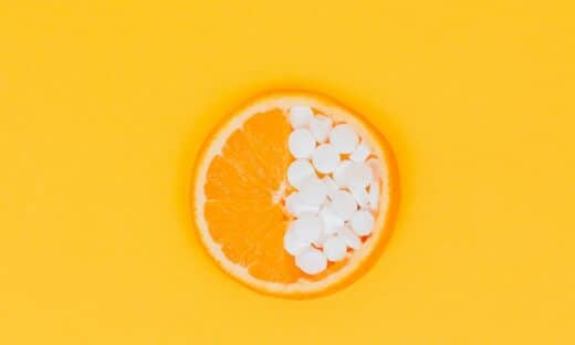 orange fruit slices on yellow surface