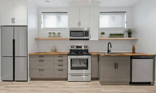 a kitchen with white cabinets