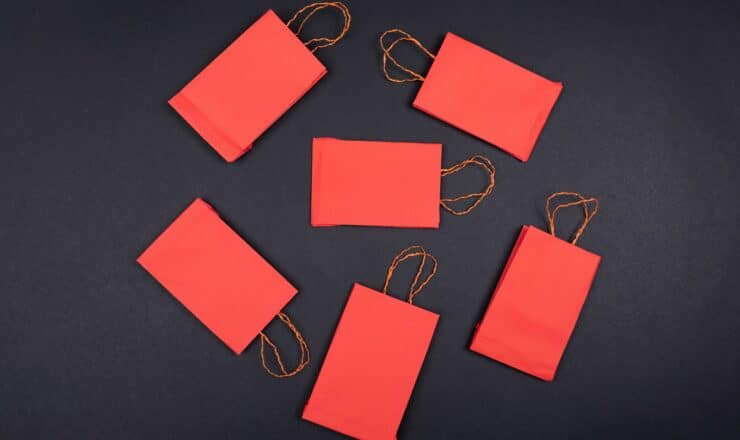 orange paper clip on black surface
