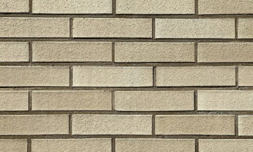 a close up of a white brick wall