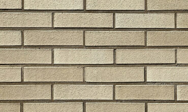 a close up of a white brick wall
