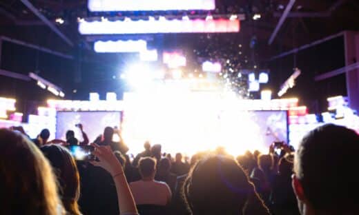 people watching band on stage