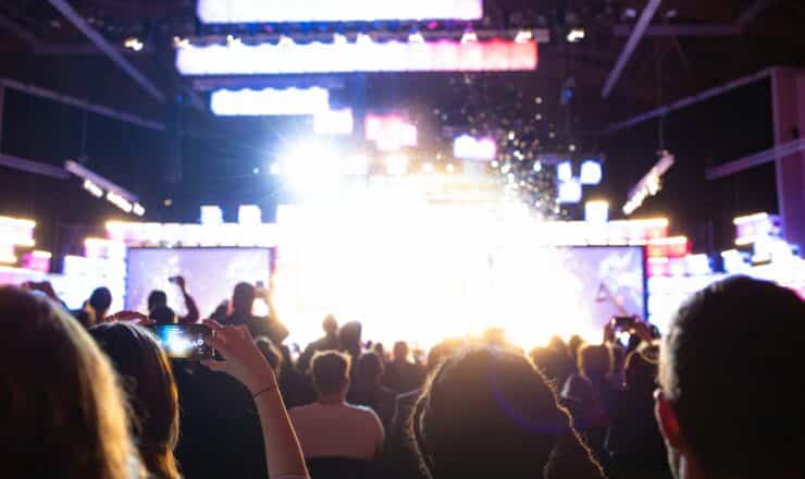 people watching band on stage