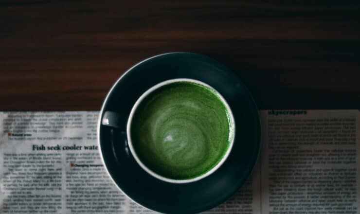 green round ceramic bowl on white paper